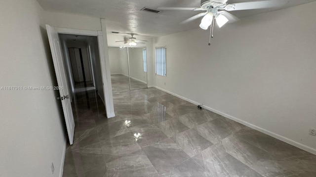 7115 SW 147th Ct, Miami, FL 33193 - unfurnished room with a ceiling fan and marble finish flooring