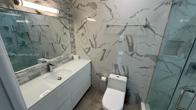 7115 SW 147th Ct, Miami, FL 33193 - bathroom with tile walls, a marble finish shower, and vanity