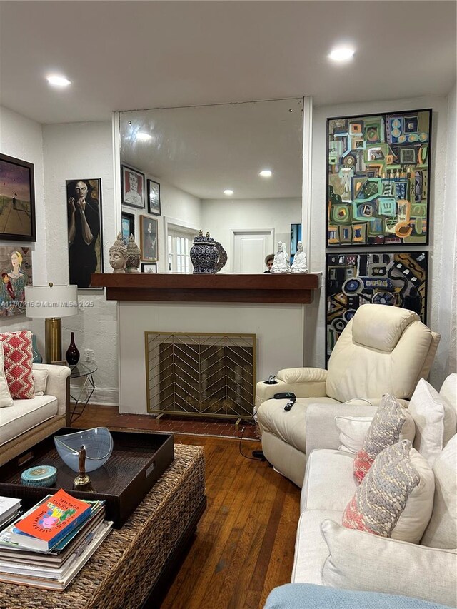 2320 SW 16th Ter, Miami, FL 33145 - living area featuring hardwood / wood-style floors, a fireplace, and recessed lighting