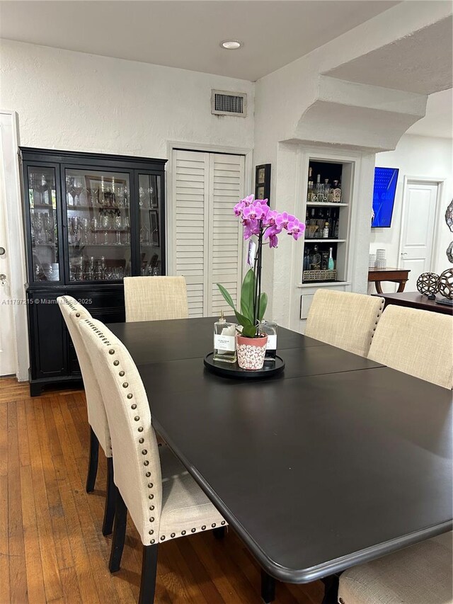 2320 SW 16th Ter, Miami, FL 33145 - dining area featuring dark wood finished floors, recessed lighting, and built in shelves