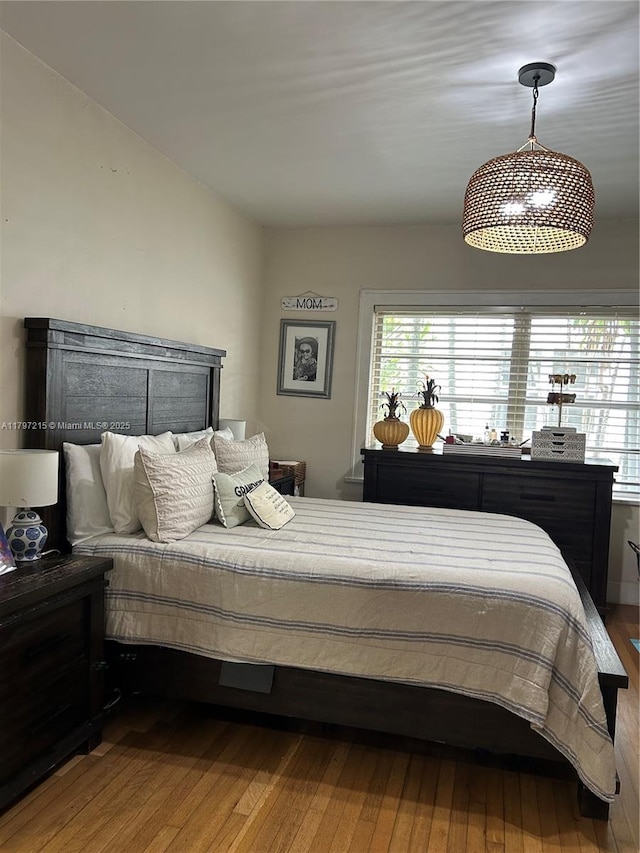 2320 SW 16th Ter, Miami, FL 33145 - bedroom featuring multiple windows and hardwood / wood-style floors