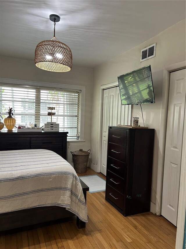 2320 SW 16th Ter, Miami, FL 33145 - bedroom with light wood-style flooring