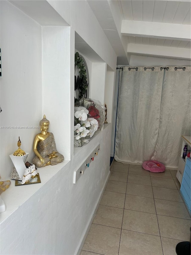 2320 SW 16th Ter, Miami, FL 33145 - full bath featuring beam ceiling, tile patterned flooring, and a shower with shower curtain