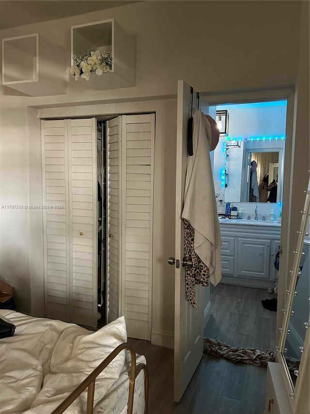 2320 SW 16th Ter, Miami, FL 33145 - bedroom with dark wood-style flooring and a closet