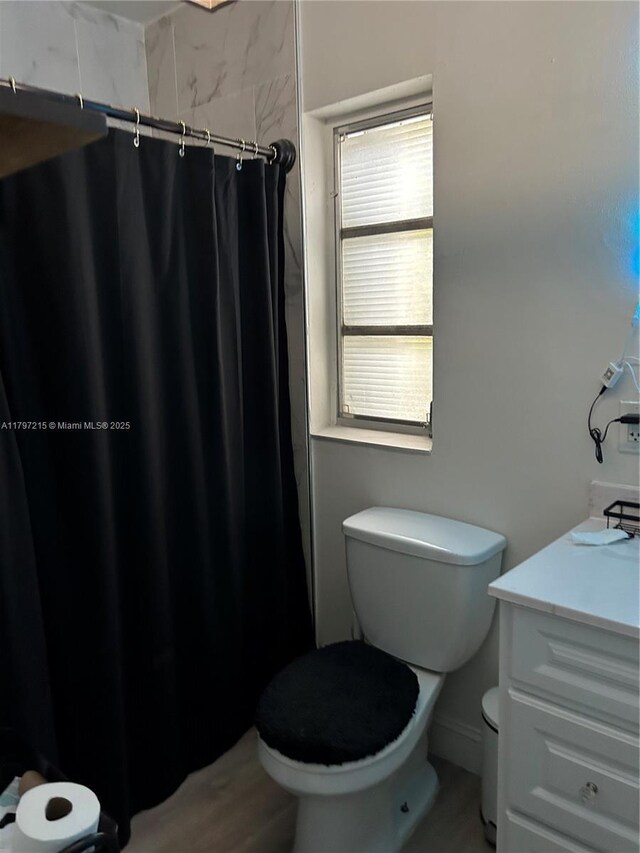 2320 SW 16th Ter, Miami, FL 33145 - full bathroom featuring vanity and a shower with shower curtain