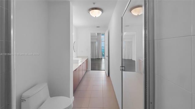 3301 NE 1st Ave Unit H1612, Miami, FL 33137 - bathroom featuring vanity, toilet, and tile patterned floors