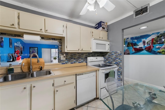 8415 SW 107th Ave Unit 323W, Miami, FL 33173 - kitchen featuring white appliances, a sink, light tile patterned floors, decorative backsplash, and a ceiling fan
