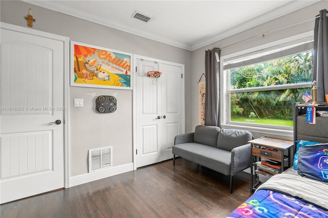 4240 SW 9th St, Plantation, FL 33317 - bedroom with wood finished floors, ornamental molding, and a closet