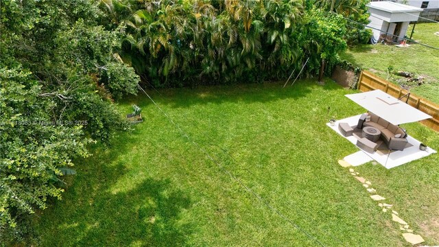 4240 SW 9th St, Plantation, FL 33317 - view of yard with an outdoor living space and a patio area