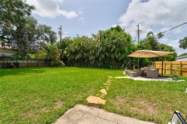 4240 SW 9th St, Plantation, FL 33317 - fenced backyard featuring an outdoor hangout area and a patio