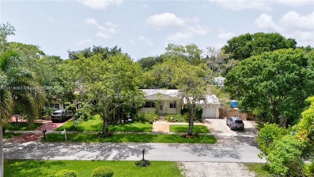 4240 SW 9th St, Plantation, FL 33317 - view of front of property with driveway and a front yard
