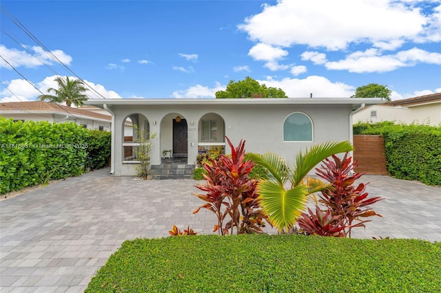 3075 SW 19th St, Miami, FL 33145 - view of front of home featuring a porch and stucco siding