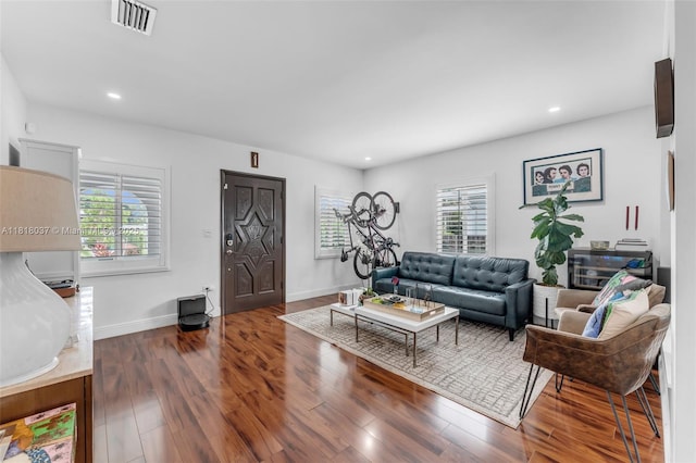 3075 SW 19th St, Miami, FL 33145 - living room with plenty of natural light, wood finished floors, and recessed lighting