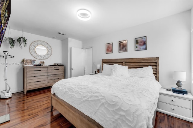 3075 SW 19th St, Miami, FL 33145 - bedroom featuring wood finished floors and baseboards