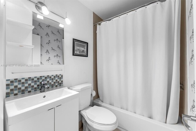 3075 SW 19th St, Miami, FL 33145 - full bath featuring tasteful backsplash, vanity, and shower / tub combo