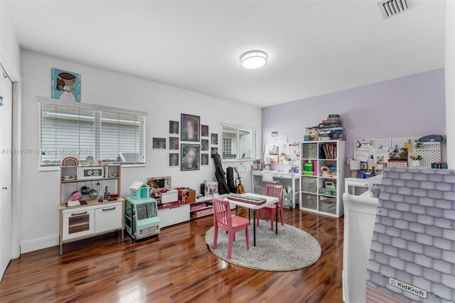 3075 SW 19th St, Miami, FL 33145 - recreation room featuring wood finished floors