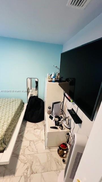 1908 NE 2nd Pl, Cape Coral, FL 33909 - bedroom featuring marble finish floors
