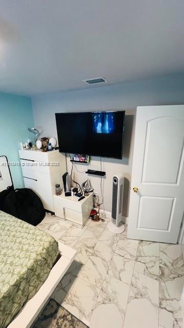 1908 NE 2nd Pl, Cape Coral, FL 33909 - bedroom with marble finish floors