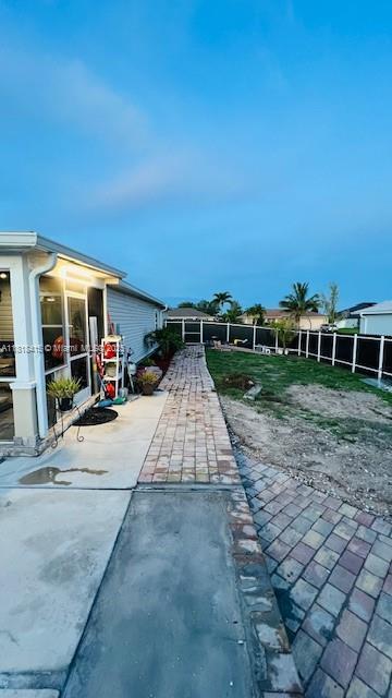 1908 NE 2nd Pl, Cape Coral, FL 33909 - view of pool with a patio