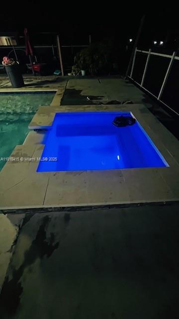1908 NE 2nd Pl, Cape Coral, FL 33909 - outdoor pool with a patio area