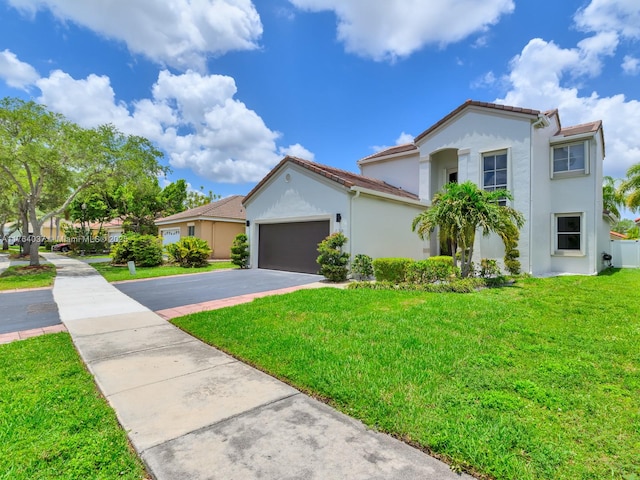 624 Stanton Dr, Weston, FL 33326 - mediterranean / spanish-style home with stucco siding, asphalt driveway, a front lawn, and an attached garage
