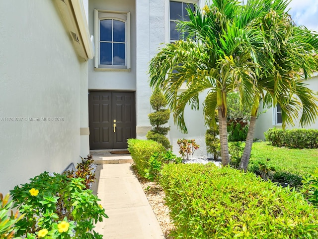 624 Stanton Dr, Weston, FL 33326 - view of exterior entry featuring stucco siding