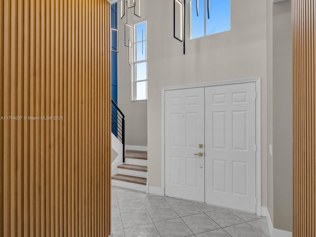 624 Stanton Dr, Weston, FL 33326 - entryway with stairway and baseboards