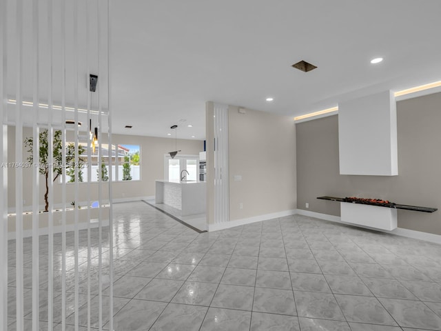 624 Stanton Dr, Weston, FL 33326 - empty room with recessed lighting and light tile patterned floors