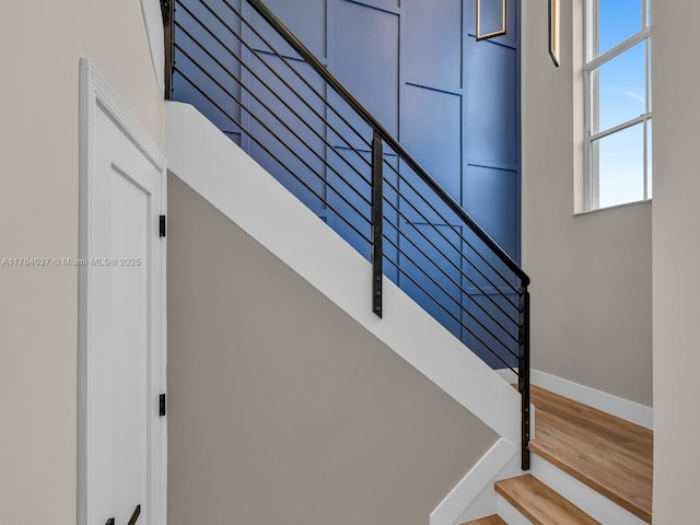 624 Stanton Dr, Weston, FL 33326 - staircase featuring baseboards and wood finished floors