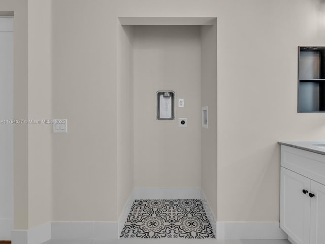 624 Stanton Dr, Weston, FL 33326 - washroom featuring electric dryer hookup, washer hookup, and tile patterned flooring