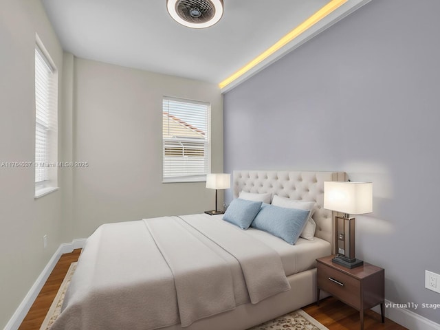 624 Stanton Dr, Weston, FL 33326 - bedroom featuring multiple windows and wood finished floors