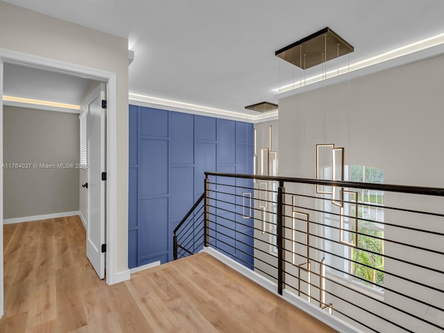 624 Stanton Dr, Weston, FL 33326 - hall featuring an upstairs landing and light wood finished floors