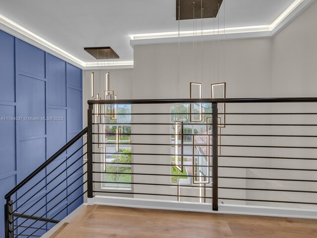 624 Stanton Dr, Weston, FL 33326 - corridor with light wood-style flooring and an upstairs landing