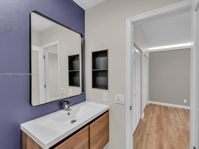 624 Stanton Dr, Weston, FL 33326 - bathroom featuring vanity and wood finished floors