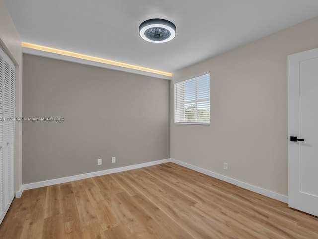 624 Stanton Dr, Weston, FL 33326 - unfurnished room with light wood finished floors and baseboards