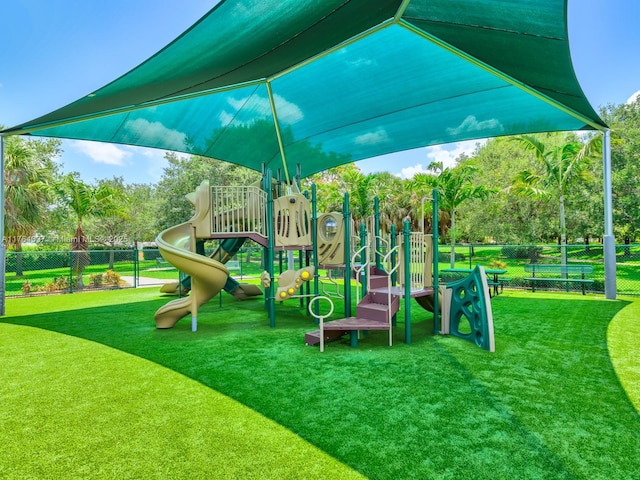 624 Stanton Dr, Weston, FL 33326 - community jungle gym with view of wooded area