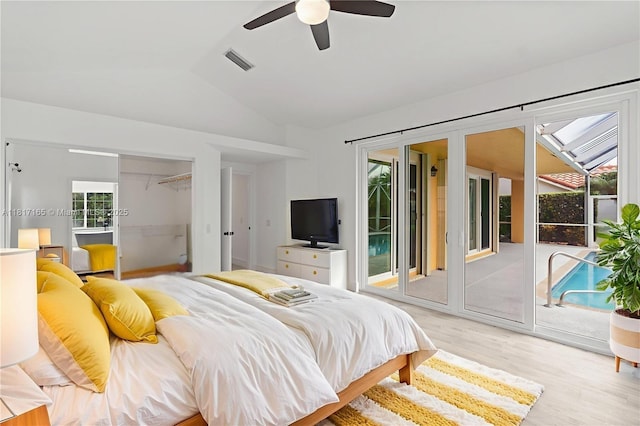 477 Spinnaker, Weston, FL 33326 - bedroom featuring access to exterior, vaulted ceiling, wood finished floors, and ceiling fan