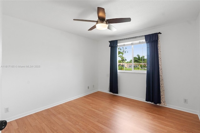 477 Spinnaker, Weston, FL 33326 - spare room featuring a ceiling fan, light wood-style flooring, and baseboards