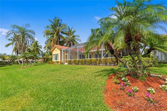 477 Spinnaker, Weston, FL 33326 - view of green lawn featuring glass enclosure