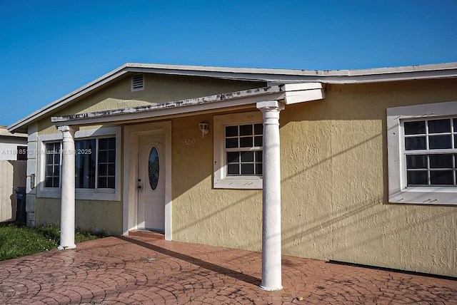 4250 SW 24th St, West Park, FL 33023 - doorway to property with stucco siding