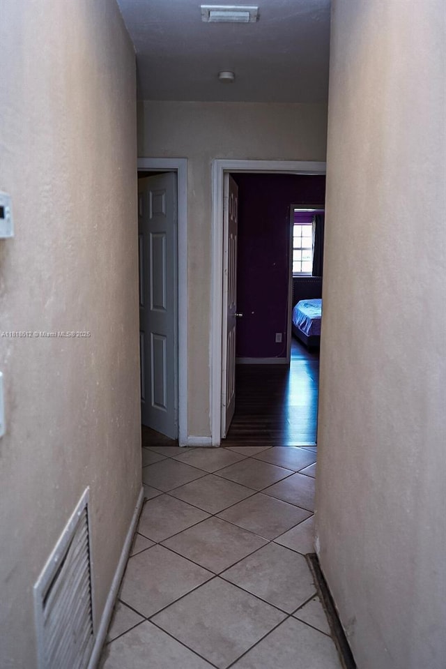 4250 SW 24th St, West Park, FL 33023 - hall featuring light tile patterned floors and baseboards