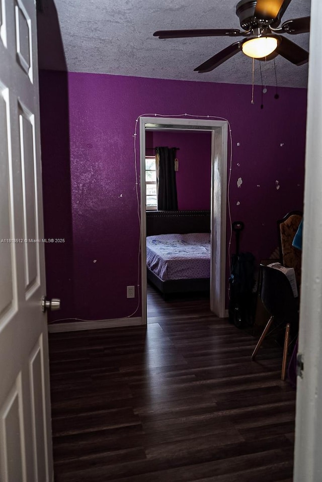 4250 SW 24th St, West Park, FL 33023 - bedroom featuring wood finished floors, a ceiling fan, and baseboards