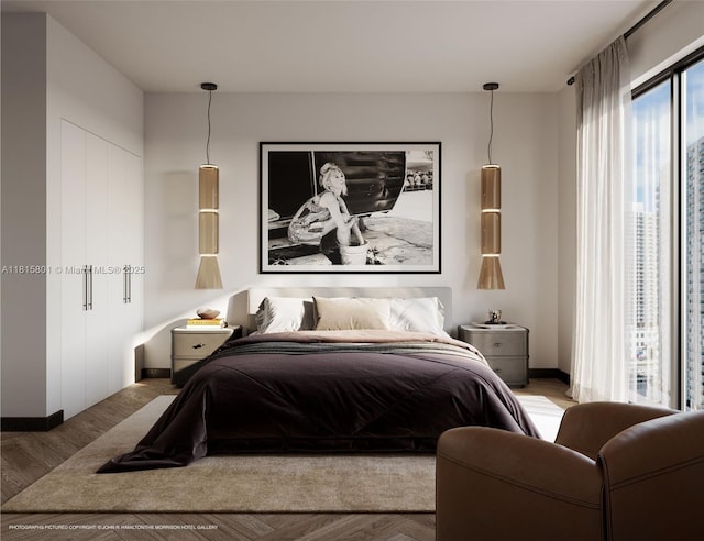 94 NE 29th St Unit 610, Miami, FL 33137 - bedroom with wood finished floors and baseboards