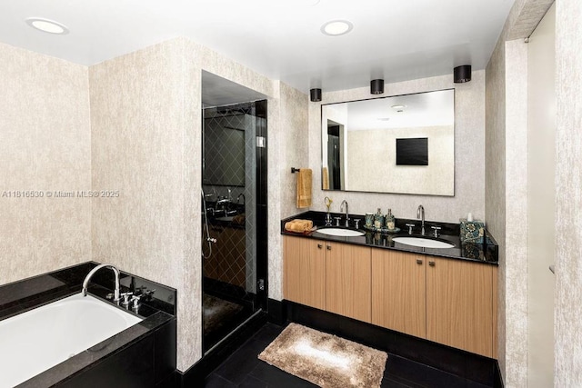 101 20 Unit 2802/2804, Miami Beach, FL 33139 - full bathroom featuring a shower stall, double vanity, a garden tub, and tile patterned floors