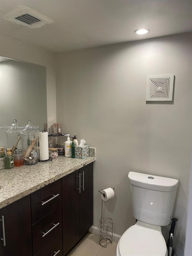 8409 N Missionwood Cir Unit D-30, Miramar, FL 33025 - half bathroom with vanity, toilet, tile patterned floors, and baseboards