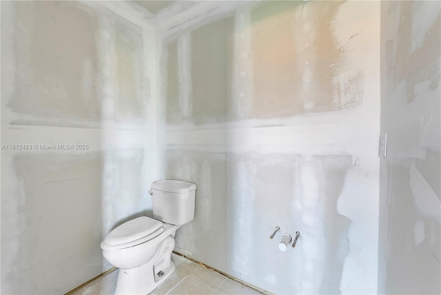 239 E Normandy E Unit 1, Delray Beach, FL 33484 - bathroom featuring toilet and tile patterned floors