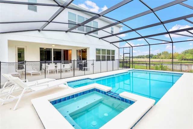 2496 Rama Dr, Kissimmee, FL 34746 - view of pool with a patio, a pool with connected hot tub, and a lanai