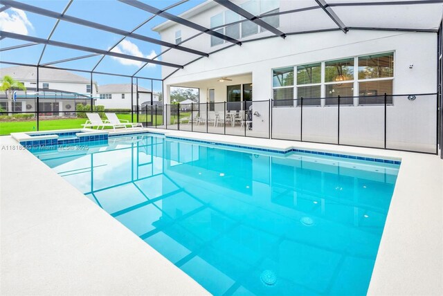 2496 Rama Dr, Kissimmee, FL 34746 - view of swimming pool featuring a patio area, a pool with connected hot tub, a lanai, and ceiling fan