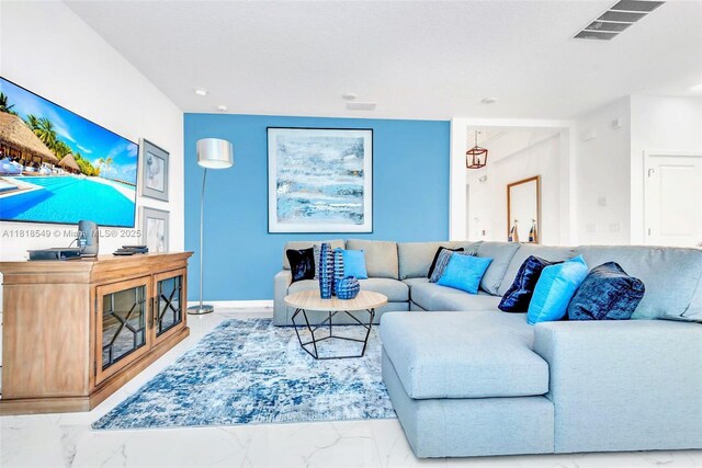2496 Rama Dr, Kissimmee, FL 34746 - living area featuring marble look tile flooring and recessed lighting