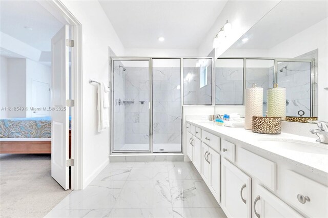 2496 Rama Dr, Kissimmee, FL 34746 - ensuite bathroom with double vanity, a marble finish shower, marble finish flooring, and recessed lighting